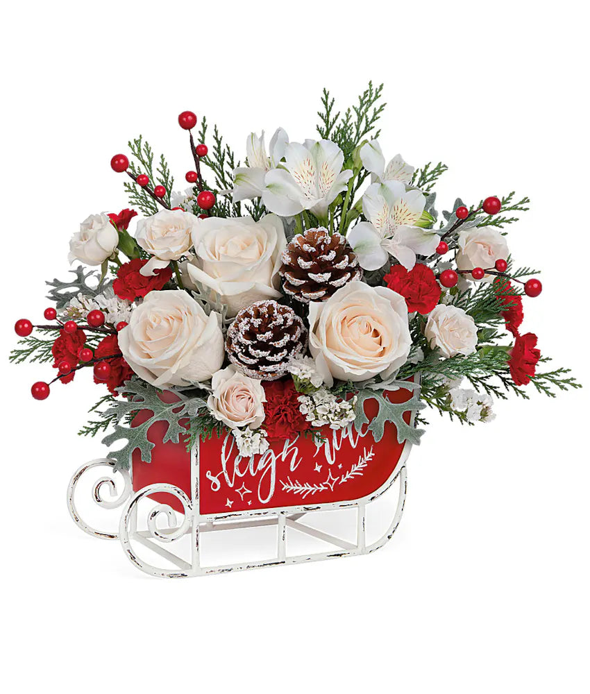 FROSTED SLEIGH ARRANGEMENT BY FLORAL ARTE